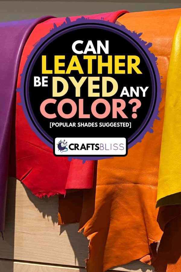 Colorful raw leather hanging on wooden shelf, Can Leather Be Dyed Any Color? [Popular shades suggested]