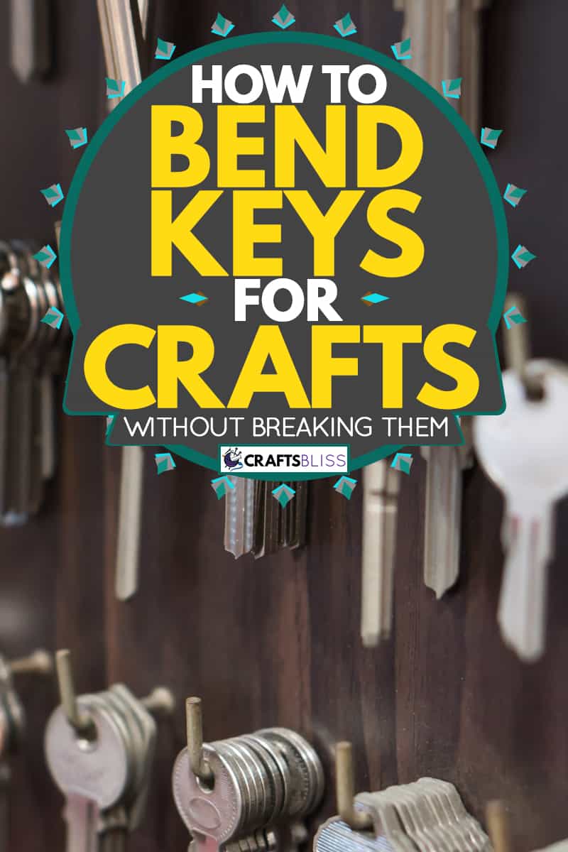 Room keys placed on key holders on a wooden wall, How to Bend Keys for Crafts (Without Breaking Them)