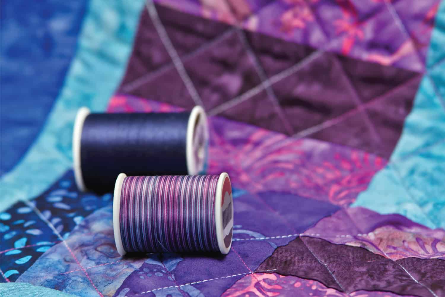 Colorful quilt and quilting thread