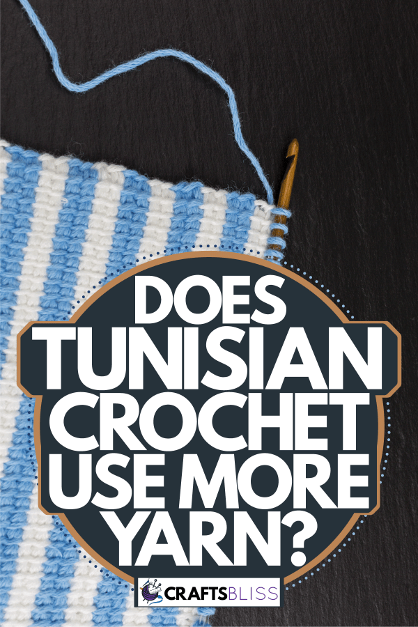 A blue and white Tunisian crochet on a dark background, Does Tunisian Crochet Use More Yarn?