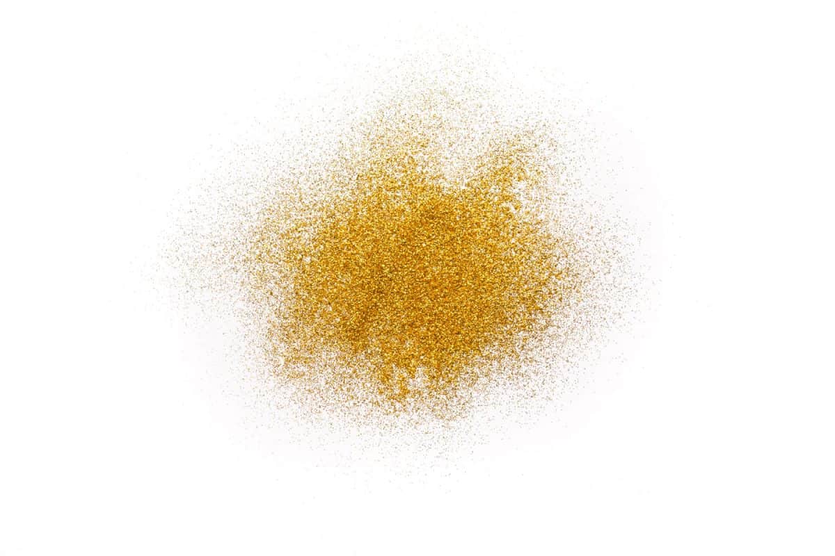 Golden glitter on a white background
