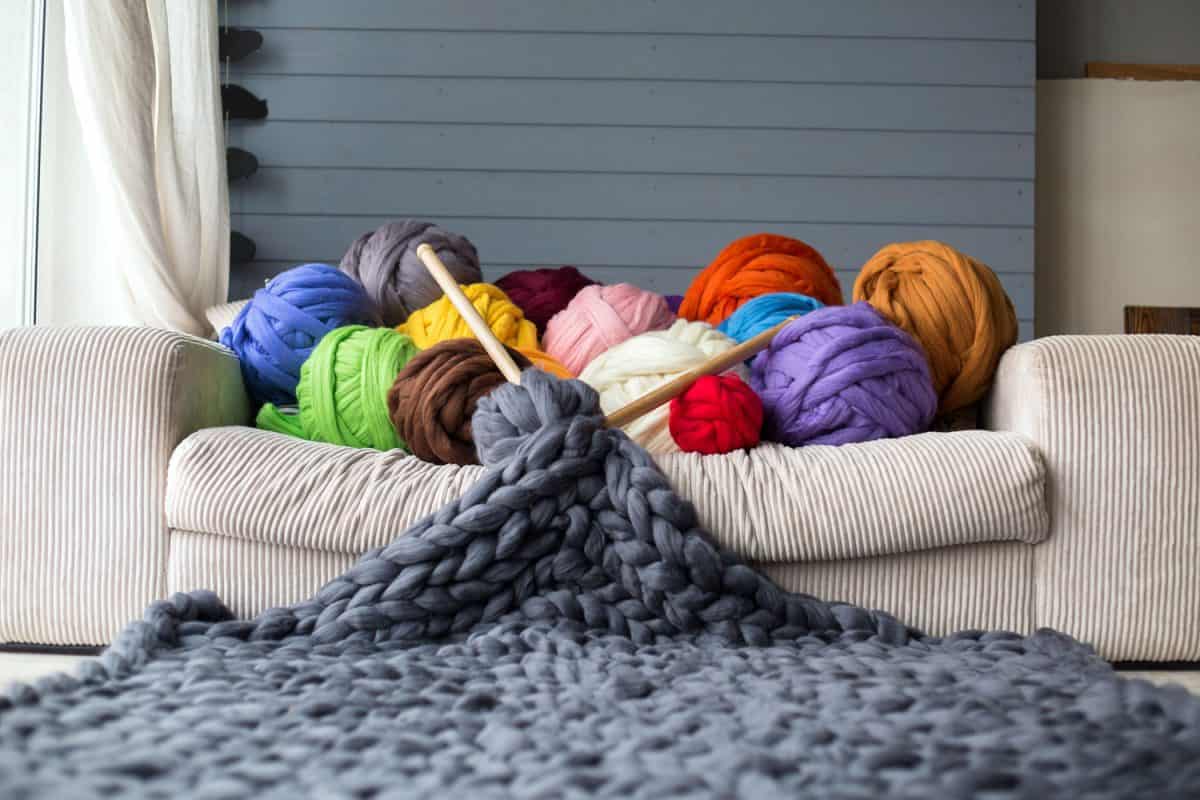 Bundles of different colored Marino wool yarn