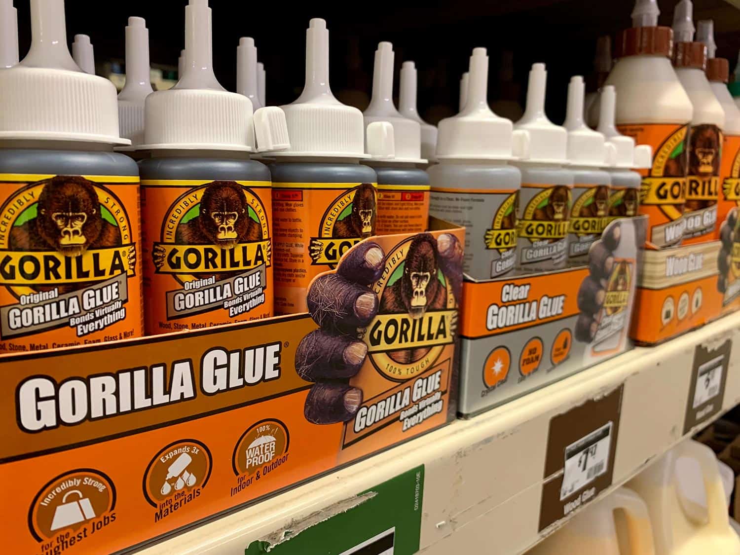 GORILLA GLUE product on shelf at home improvement retail store aisle